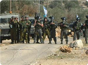 2012 File photo: Israeli forces attack unarmed marchers in Kafr Qaddum village